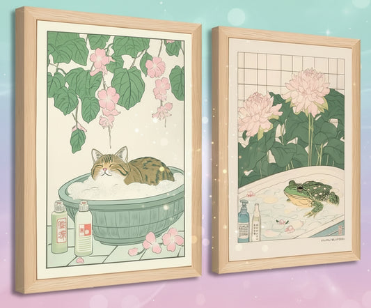 Two framed illustrations of a cat and a frog in a bath with flowers and bottles.