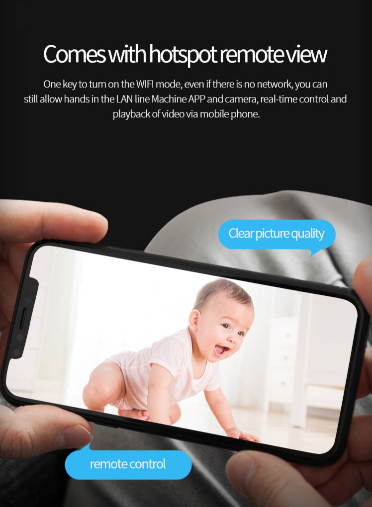 Person holding a smartphone with a baby on the screen, featuring hotspot remote view capabilities.