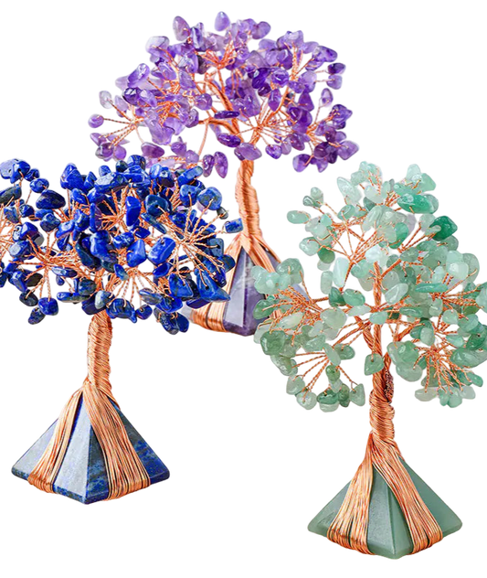 Decorative crystal trees in blue, purple, and green on a neutral background