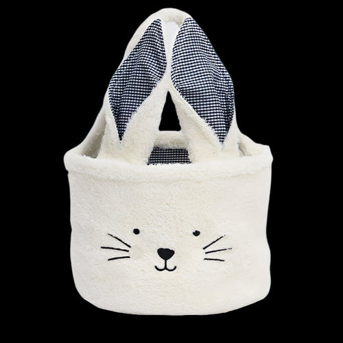 White basket with bunny ears and face on a white background