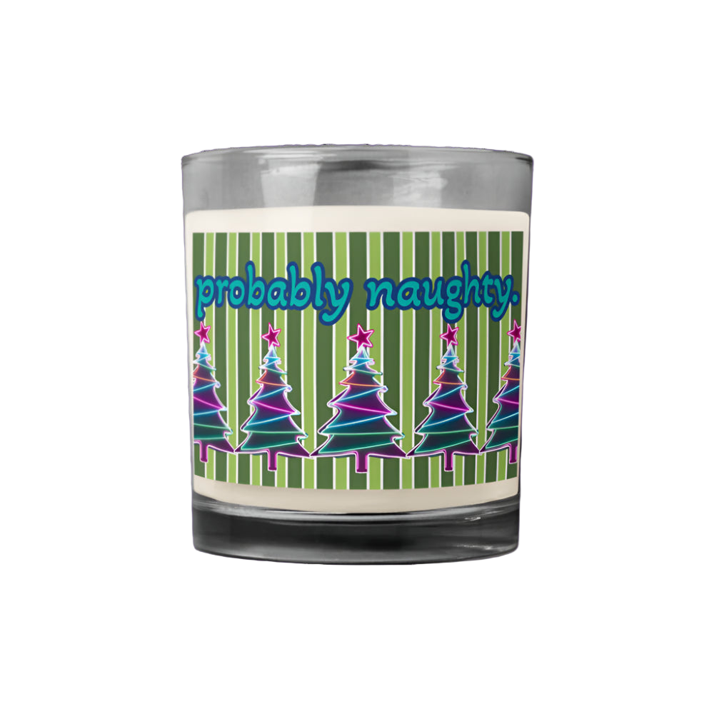 Candle with a label featuring Christmas trees and the text 'probably naughty' on a white background.