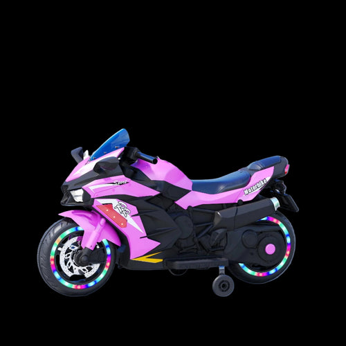 Pink and black toy motorcycle with colorful wheels on a snowy surface