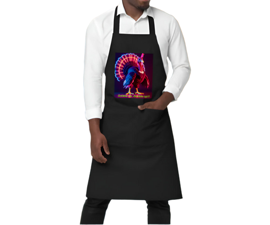 Man wearing a black apron with a colorful graphic design on a white background