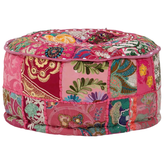 Multicolored patchwork ottoman with floral and paisley patterns on a white background