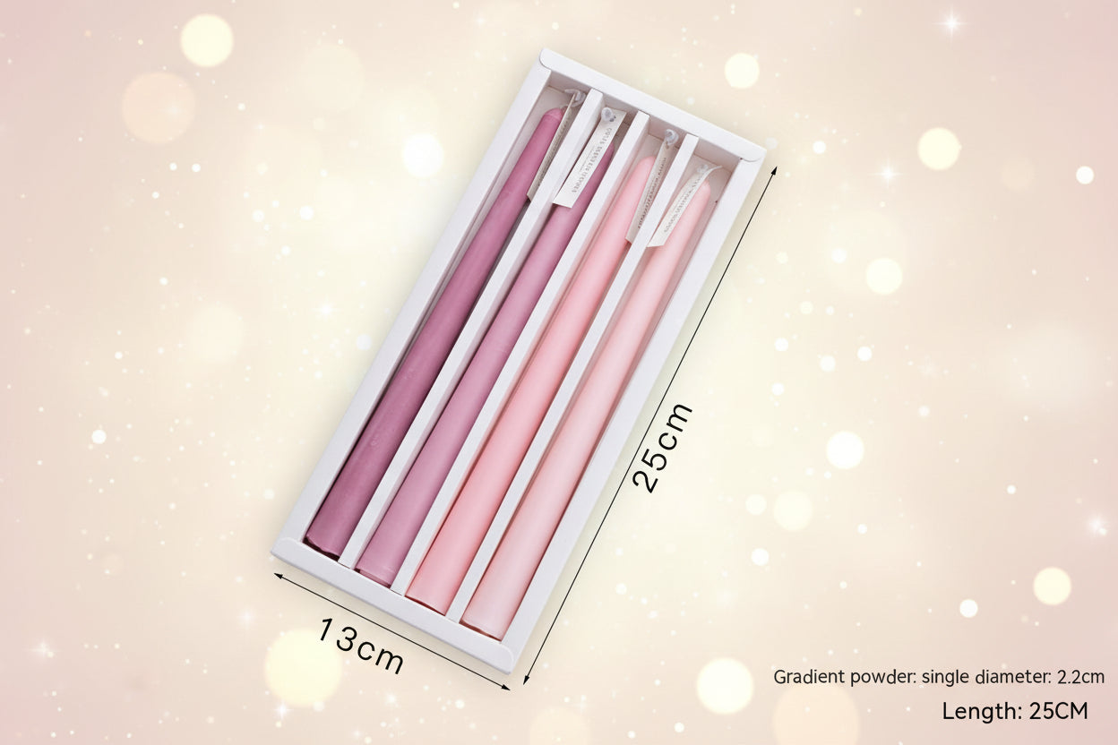 Set of gradient pink pens in a box with measurements on a light background
