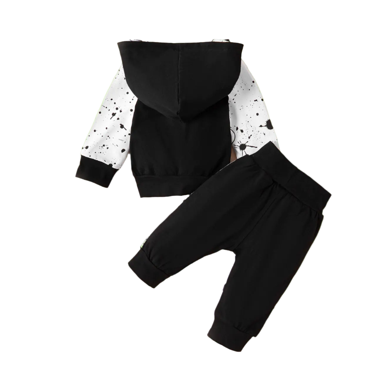 Black hoodie and pants set on a beige background with decorative elements.