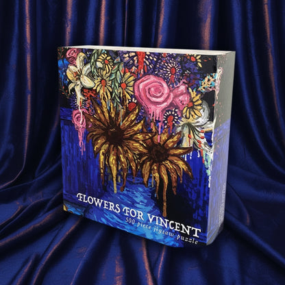 Colorful puzzle box with floral design and 'Flowers for Vincent' text on a dark blue background
