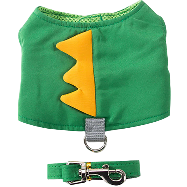 Green dog harness with yellow mouthpiece and matching leash on a white background