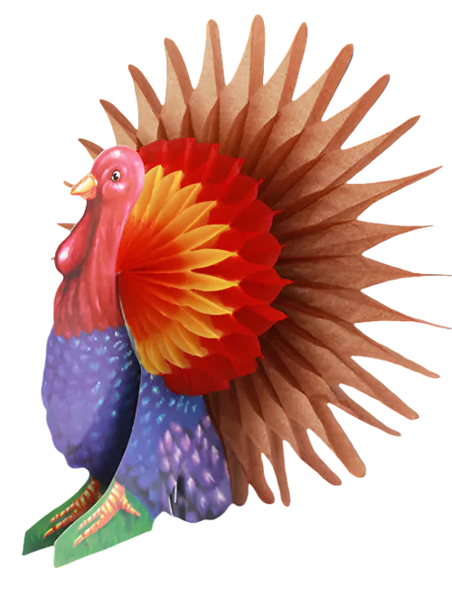 Colorful paper turkey decoration on a table with a cup and plate in the background.