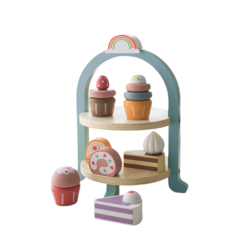 Children's toy tea set with pastel colors on a white surface