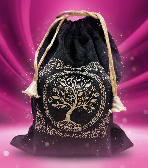 Black drawstring bag with gold tree of life design on a white background