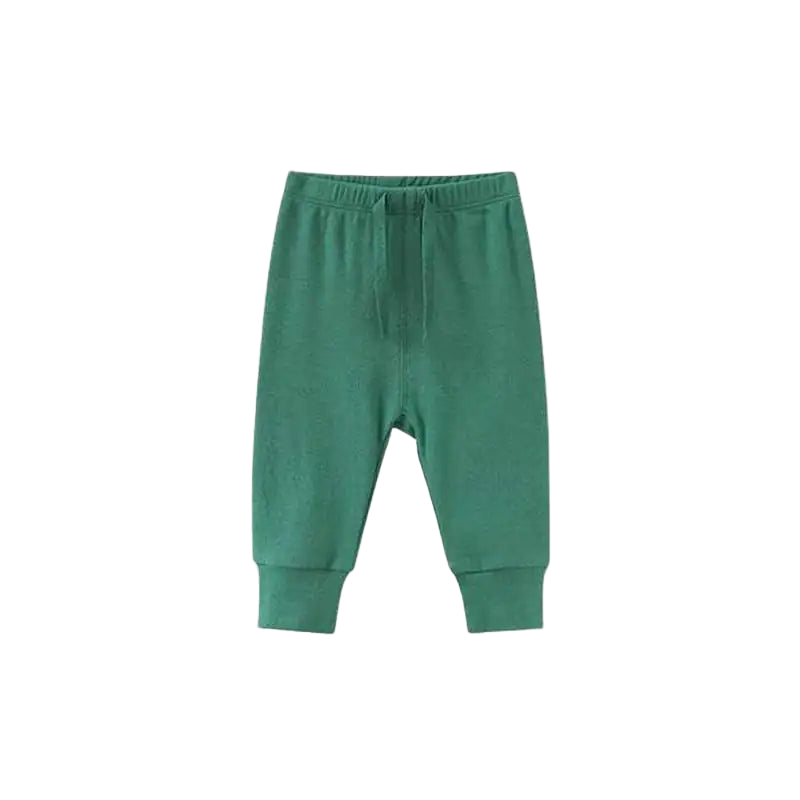 Green baby pants on a white background