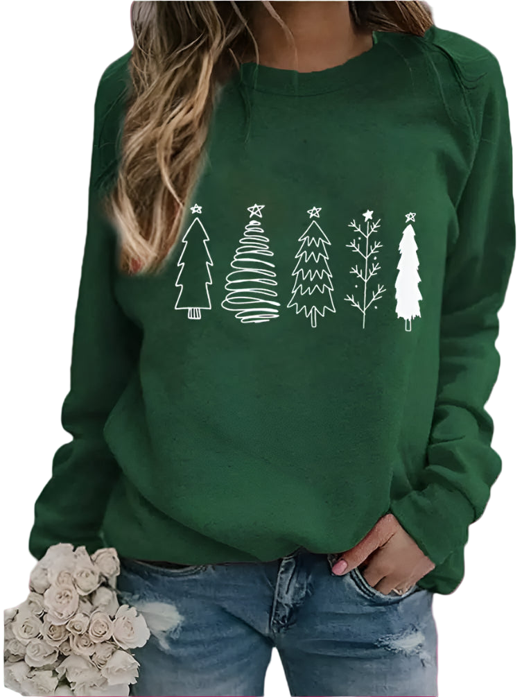 Green sweatshirt with white Christmas tree designs worn by a person, holding flowers.