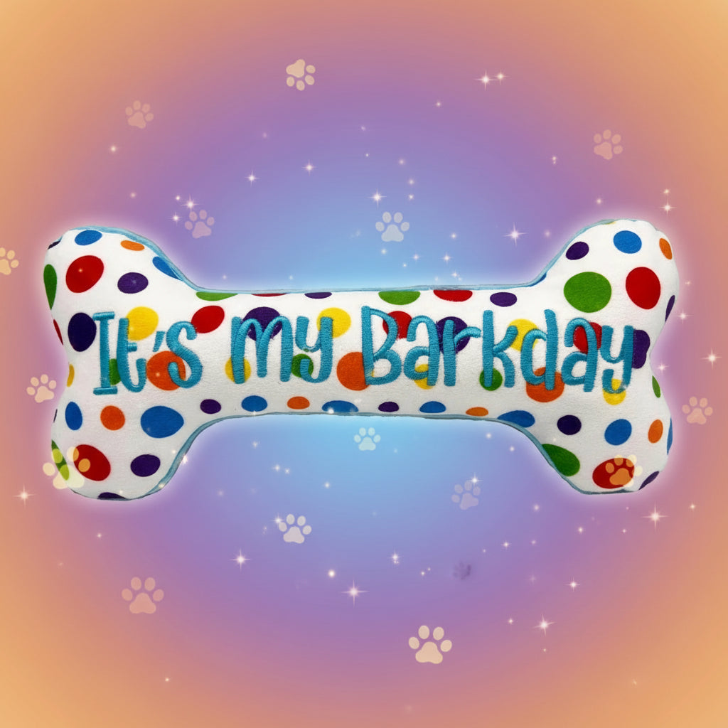 Polka dot bone-shaped toy with 'It's my barkday' text on a white background