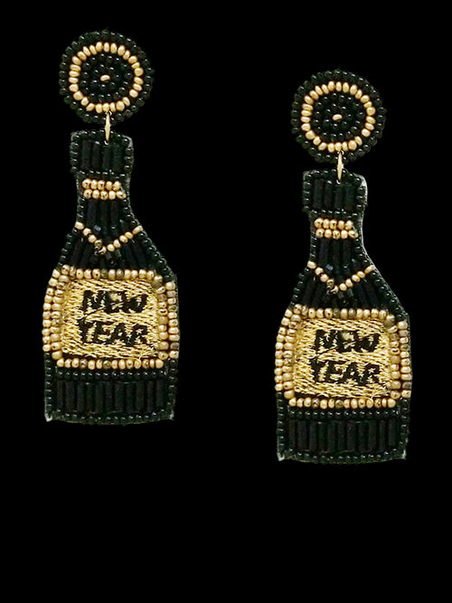 Beaded earrings with 'New Year' text next to a quarter for scale on a white background