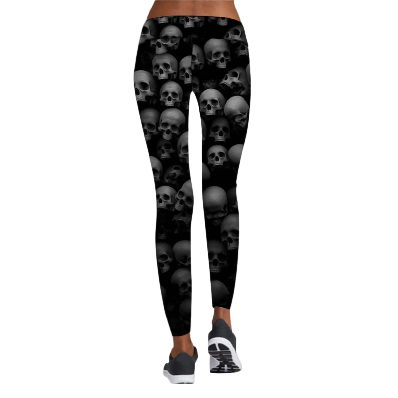 Black leggings with skull pattern worn by a person on a white background