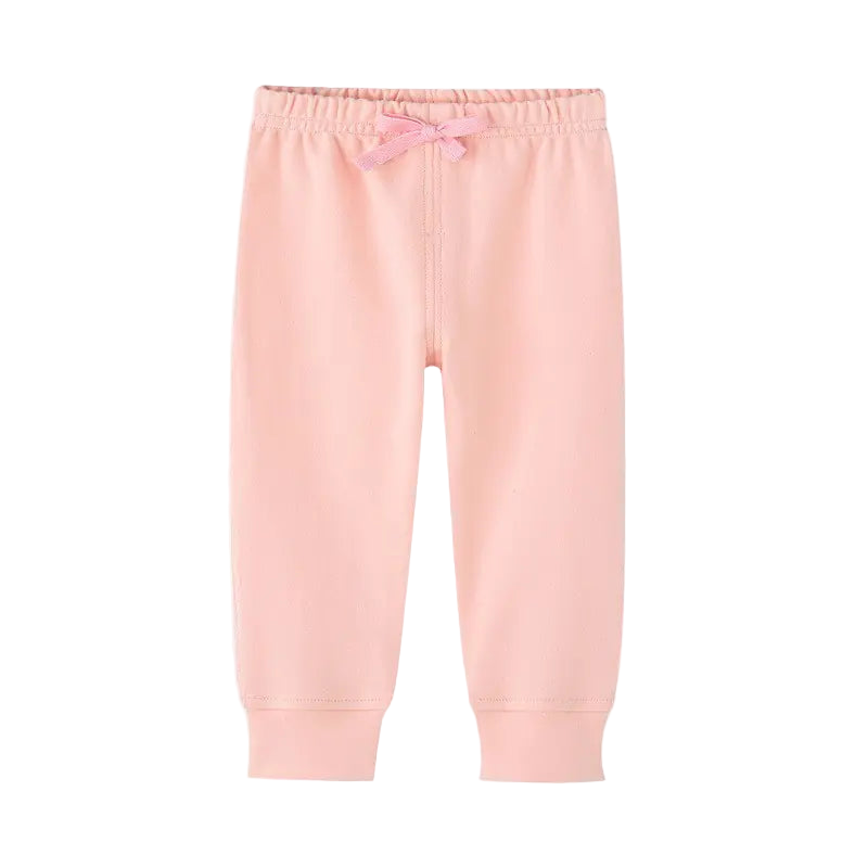 Pink baby pants with a bow on a white background
