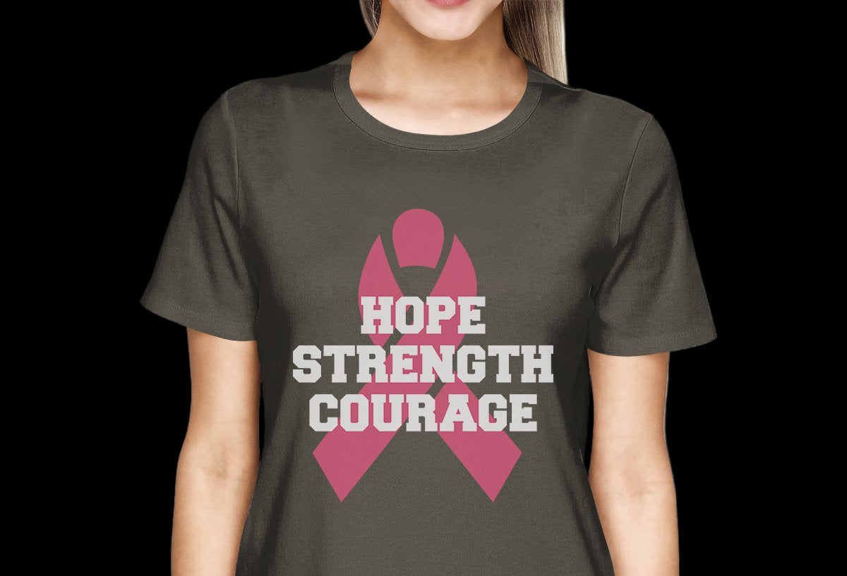 Person wearing a dark gray t-shirt with a pink ribbon and text 'Hope Strength Courage' on a white background