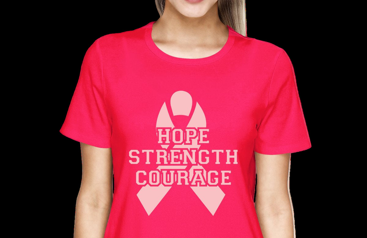 Person wearing a pink t-shirt with a breast cancer awareness ribbon and text on a white background