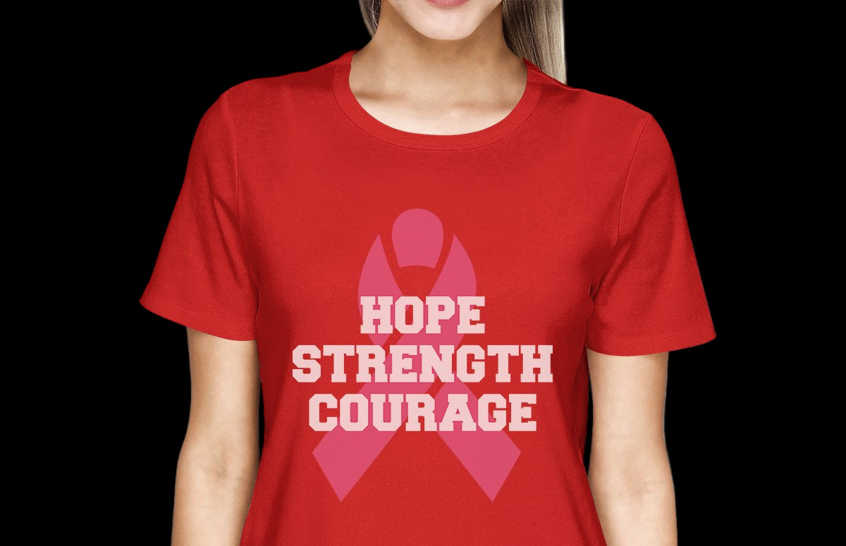 Red t-shirt with pink ribbon and 'Hope Strength Courage' text on a white background