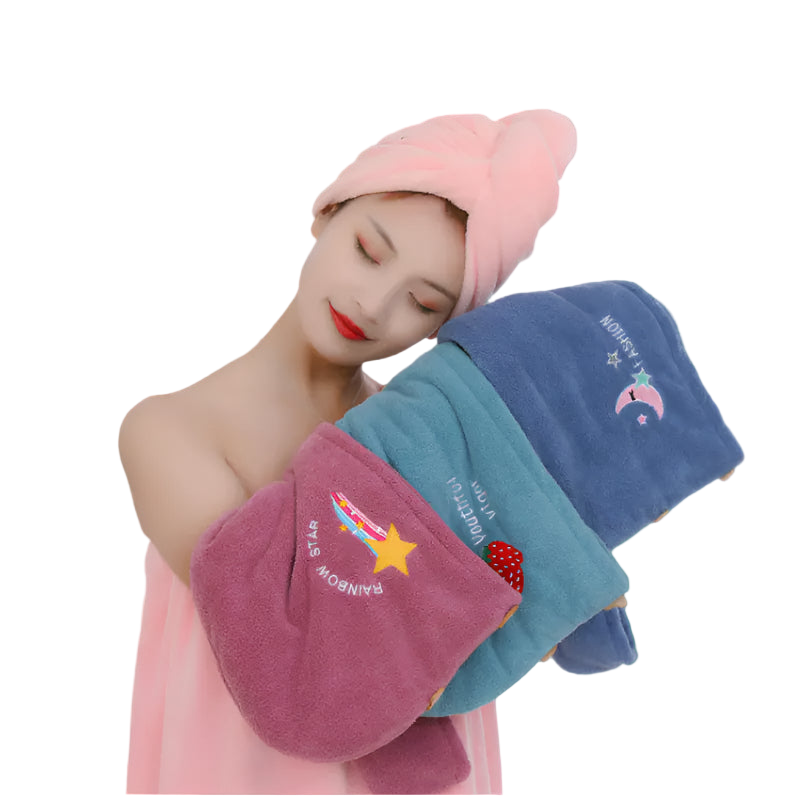 Mannequin wearing a pink towel on head with colorful towels draped over shoulders against a white background