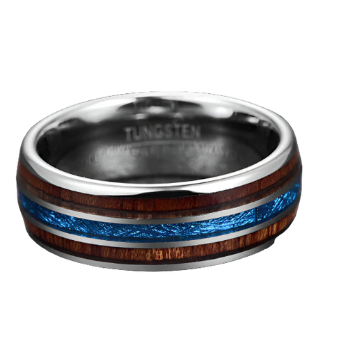 Tungsten ring with wooden and blue inlay on a gray background