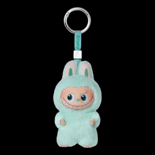 Plush keychain in a mint green costume with a character's face on a white background
