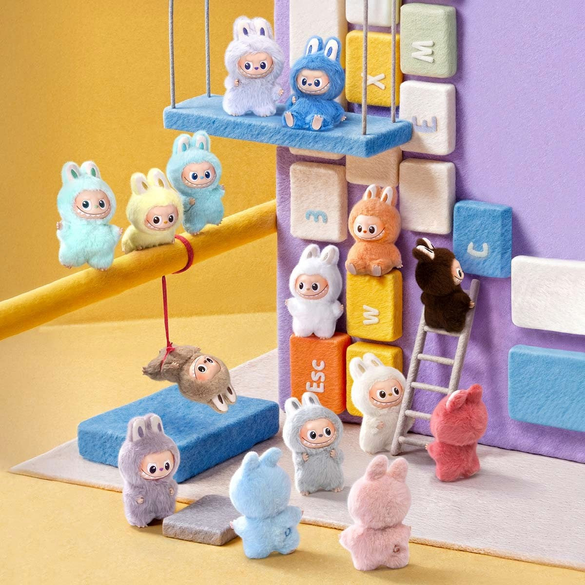 Colorful plush toys on a play structure with a yellow and purple background