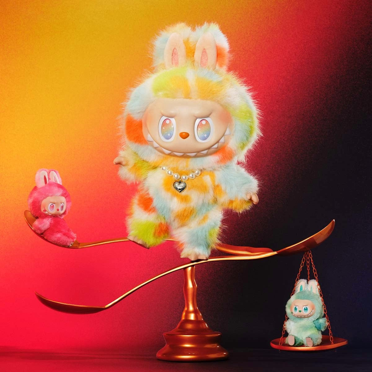 Colorful plush toy with bunny ears on a golden spoon against a gradient background