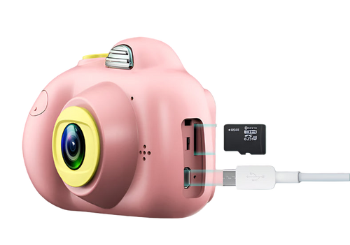 Pink digital camera with microSD card and USB cable on a pink background