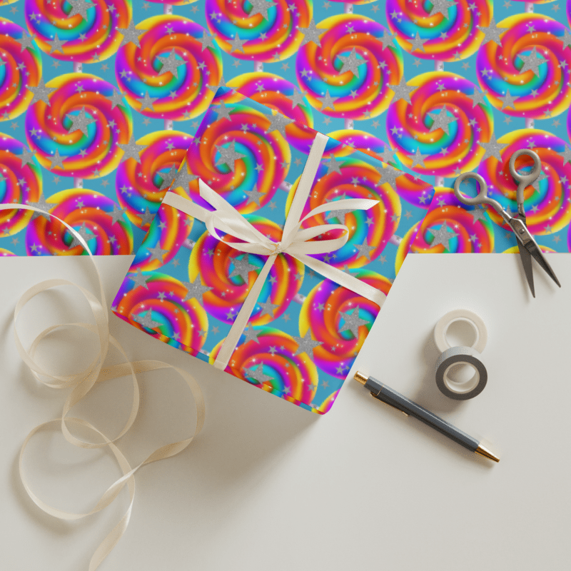 Gift box with rainbow swirl pattern on a white surface with ribbon and scissors.