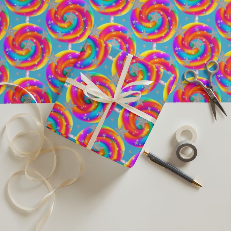 Gift box with ribbon on a table against a colorful swirl patterned background