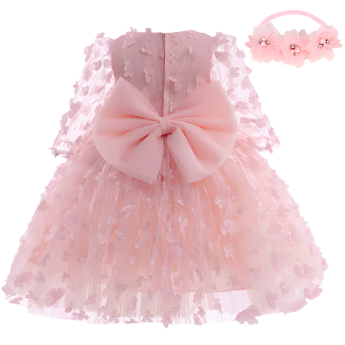 Pink lace dress with a large bow and matching headband on a white background