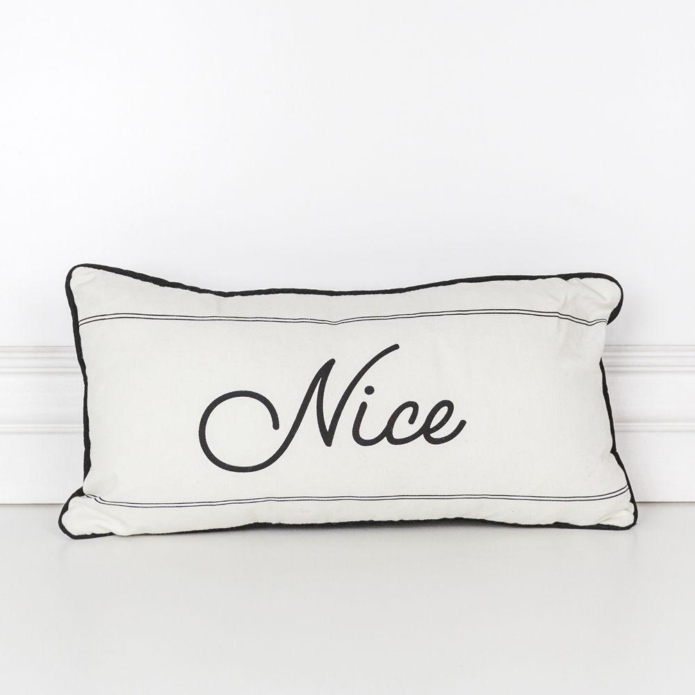 White pillow with black piping and the word 'Nice' on a white background