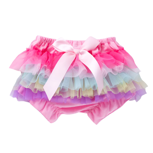 Colorful tutu skirt with a pink bow on a white background