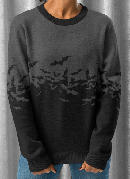Person wearing a dark gray sweater with bat pattern on a transparent background