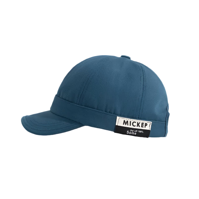 Blue cap with a 'MICKEP' label on a white background
