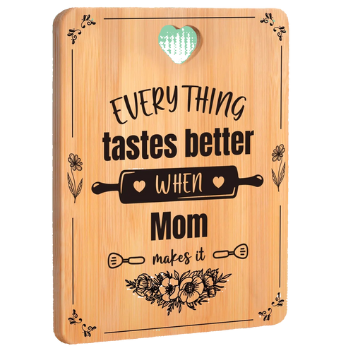 Wooden cutting board with engraved text and design on a white background