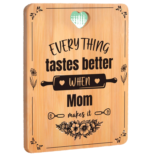 Wooden cutting board with engraved text and design on a white background