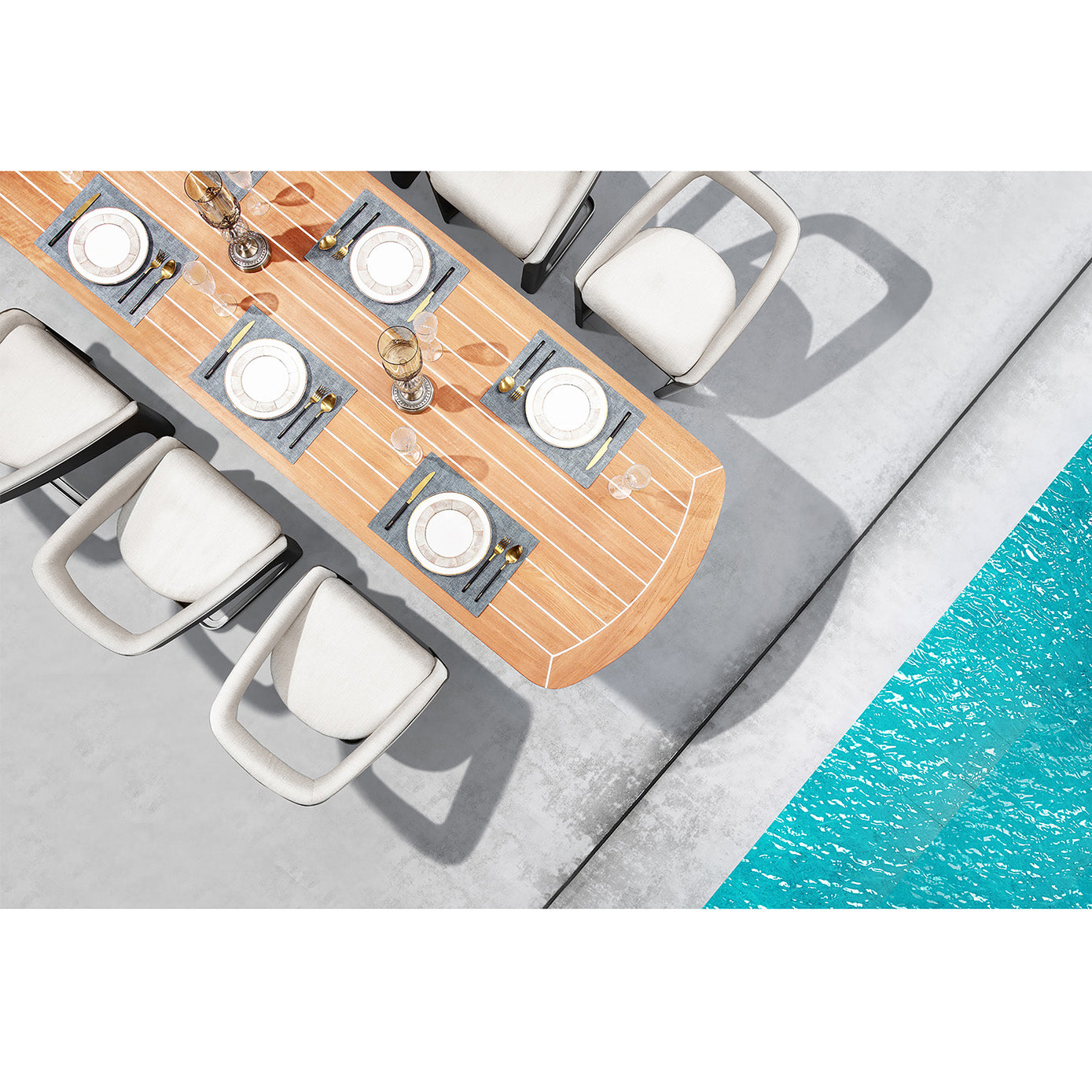 Wooden outdoor dining table with white chairs by a pool