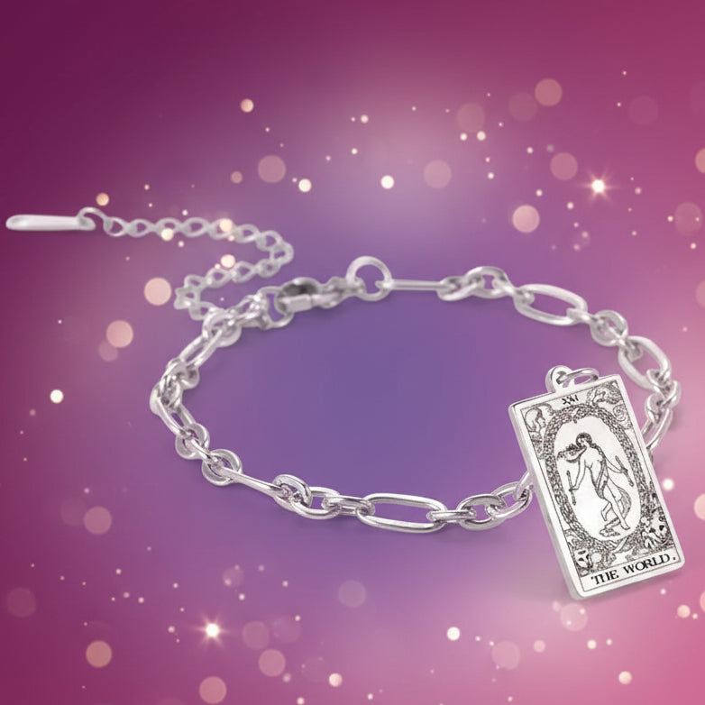 Silver bracelet with tarot card charm on a white background
