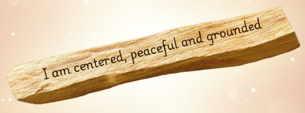 Wooden stick with engraved text on a white background