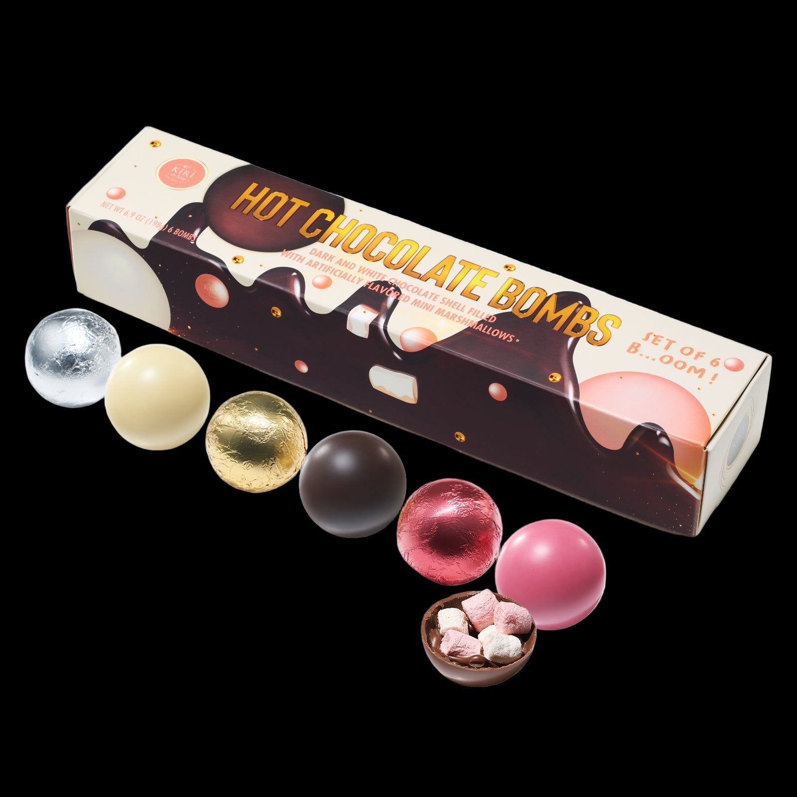 Box of Hot Chocolate Bombs with colorful chocolate bombs and a small bowl of pink and white chocolate bombs on a white background.