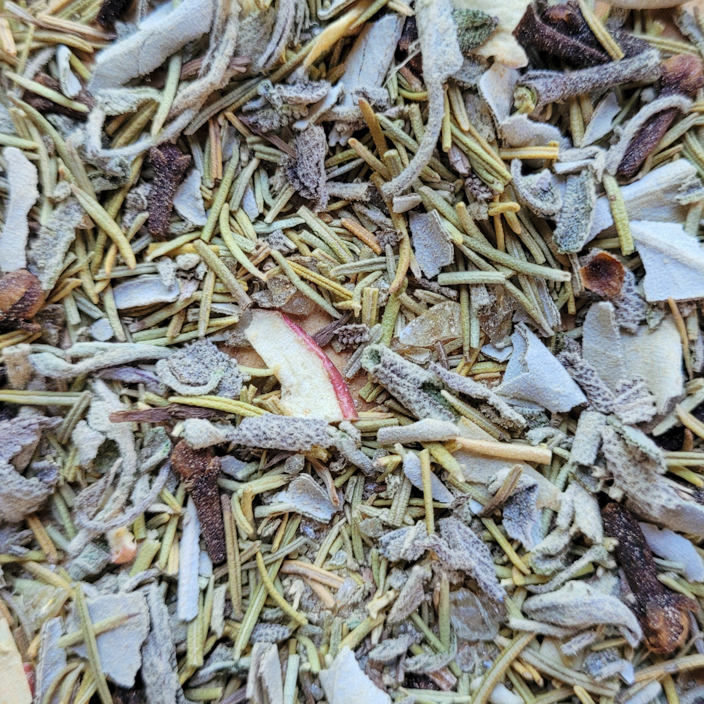Close-up of a mix of dried herbs and spices with a focus on texture and color.