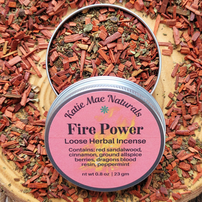 Katie Mae Naturals Fire Power Loose Herbal Incense on a wooden surface