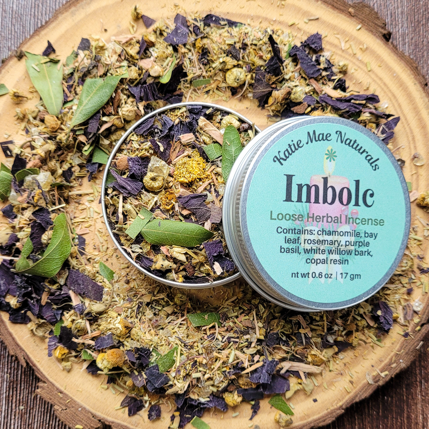 Katie Mae Naturals Imbolic loose herbal incense on a wooden surface