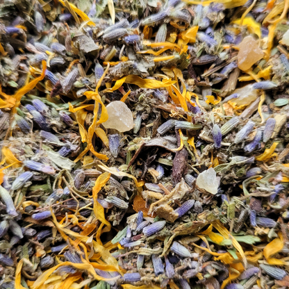 Close-up of dried herbs and flowers with visible textures and colors.