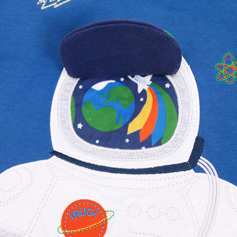 Close-up of an astronaut costume with a colorful helmet design on a blue background