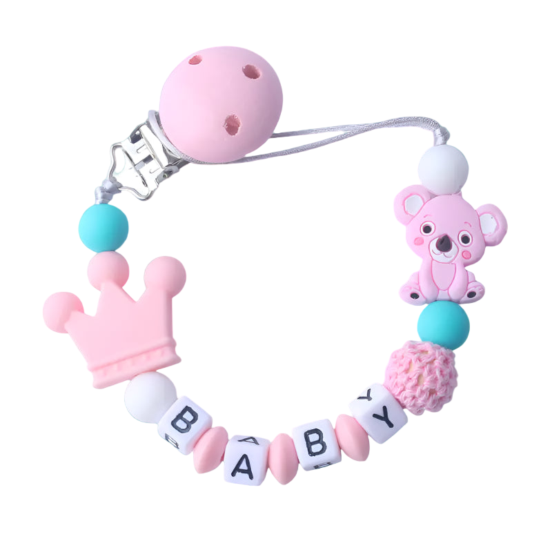 Baby teething necklace with pink bear, crown, and 'BABY' letter beads on a white background