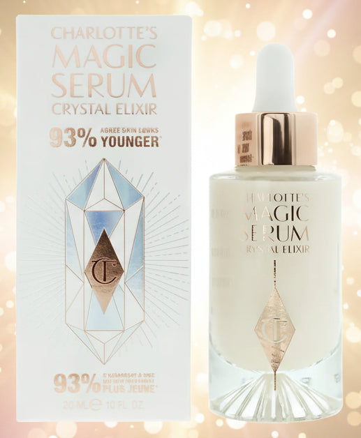 Charlotte's Magic Serum Crystal Elixir bottle and packaging on a white background